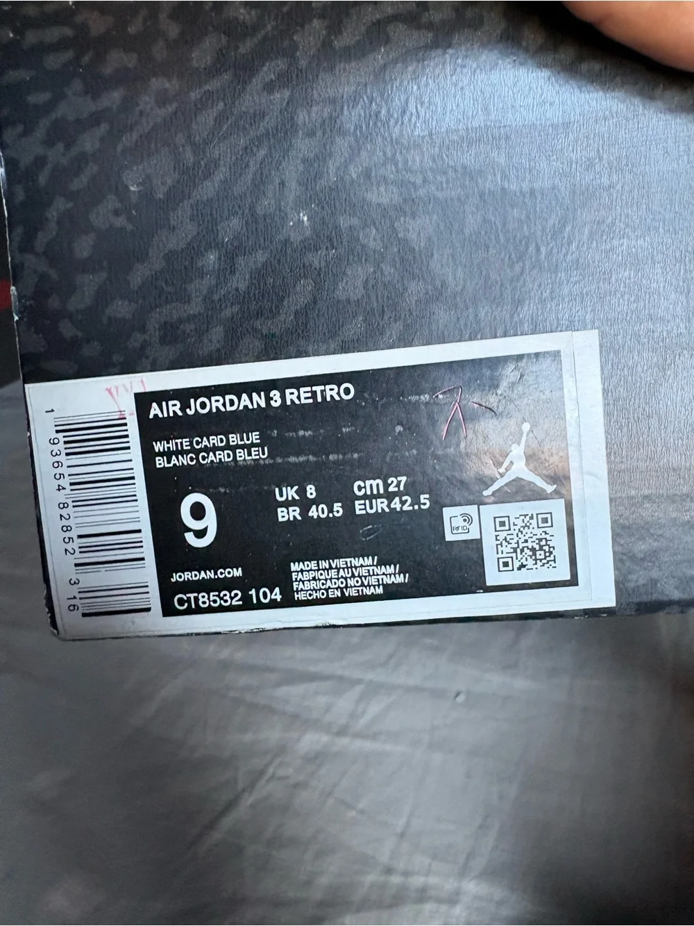 Jordan Men’s White Sneakers with Blue and Red Accents
